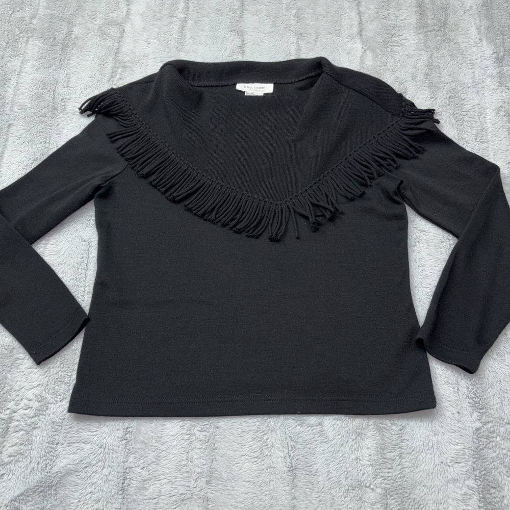 Miss Dorby black knit top featuring a‎ distinct fringed v-shaped neckline Petite
